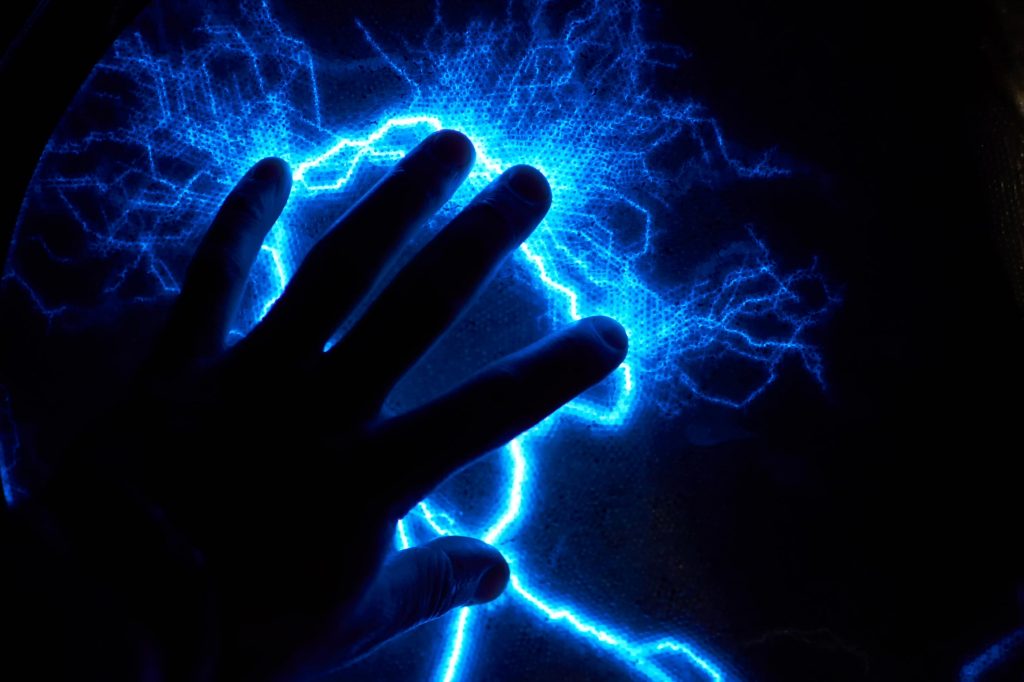 Turbostatix - hand touching a surface that is electrostatically charged